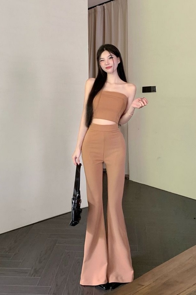 Two-piece set featuring a vest and flared pants.