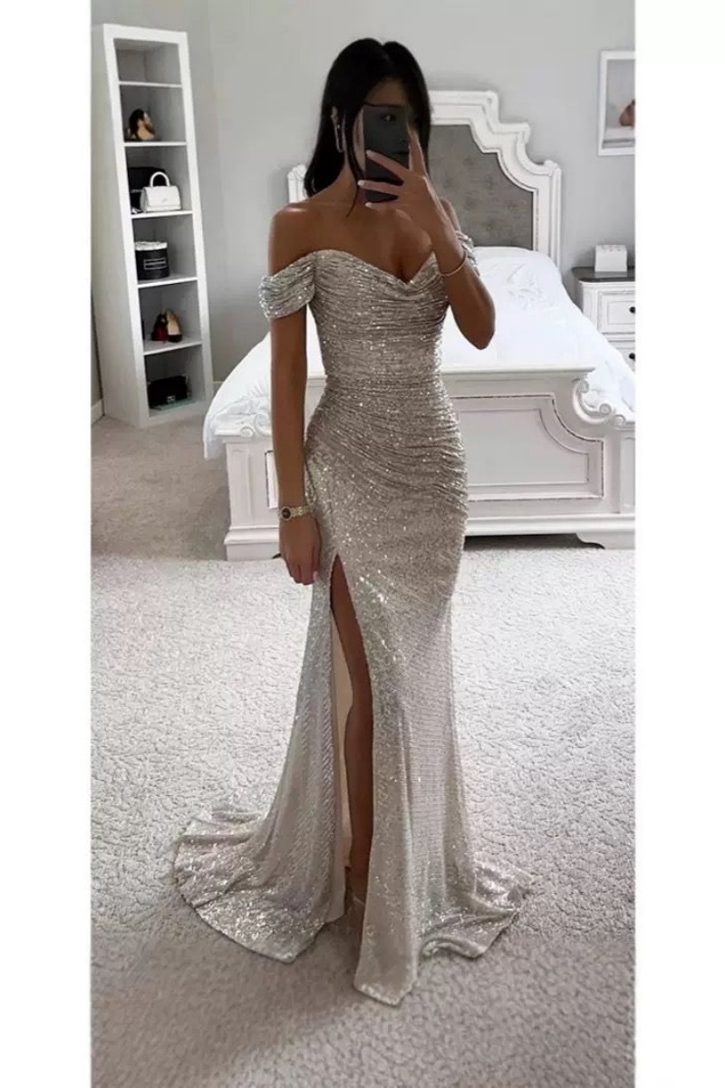 Sleek, high-slit, glittery sequined dress.